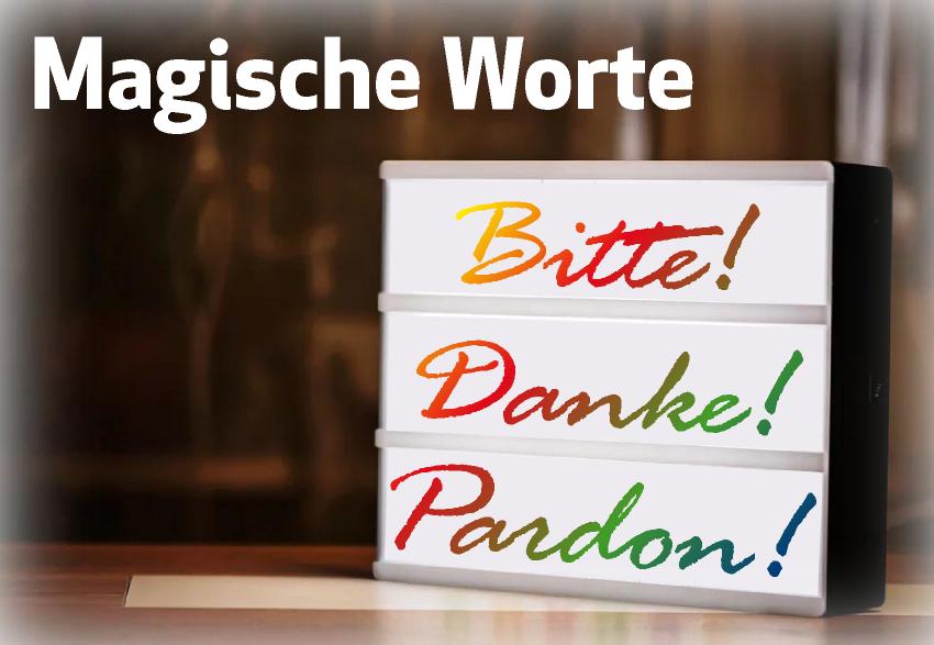 Auf einem Leuchtkasten erscheinen in Regenbogenfarben die Worte: Bitte! Danke! Pardon!